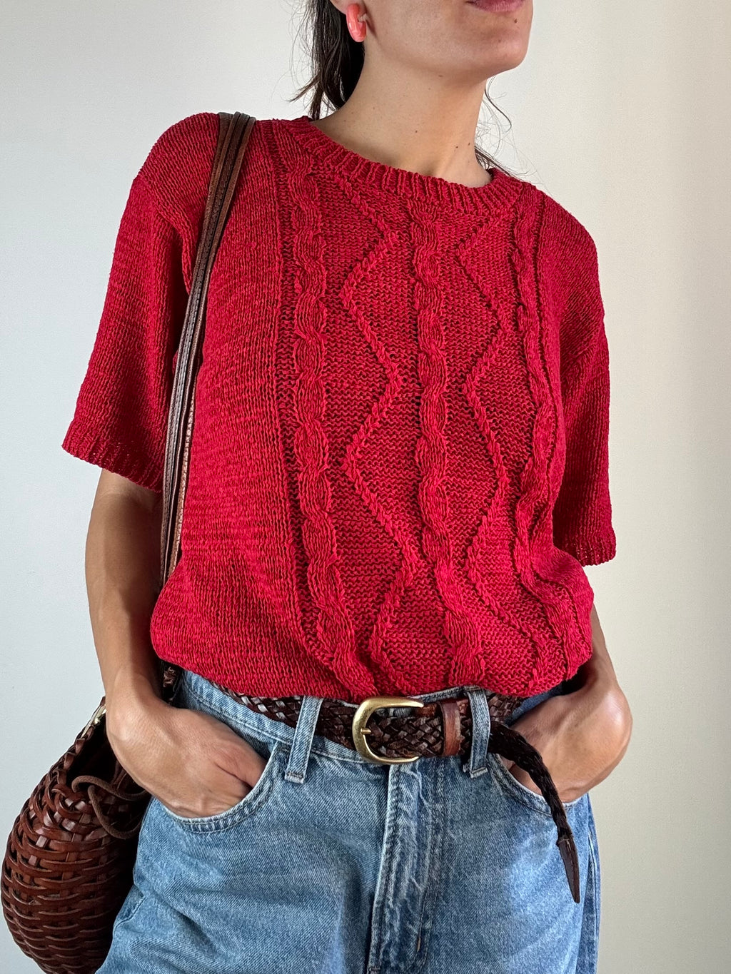 Maglia rossa a trecce