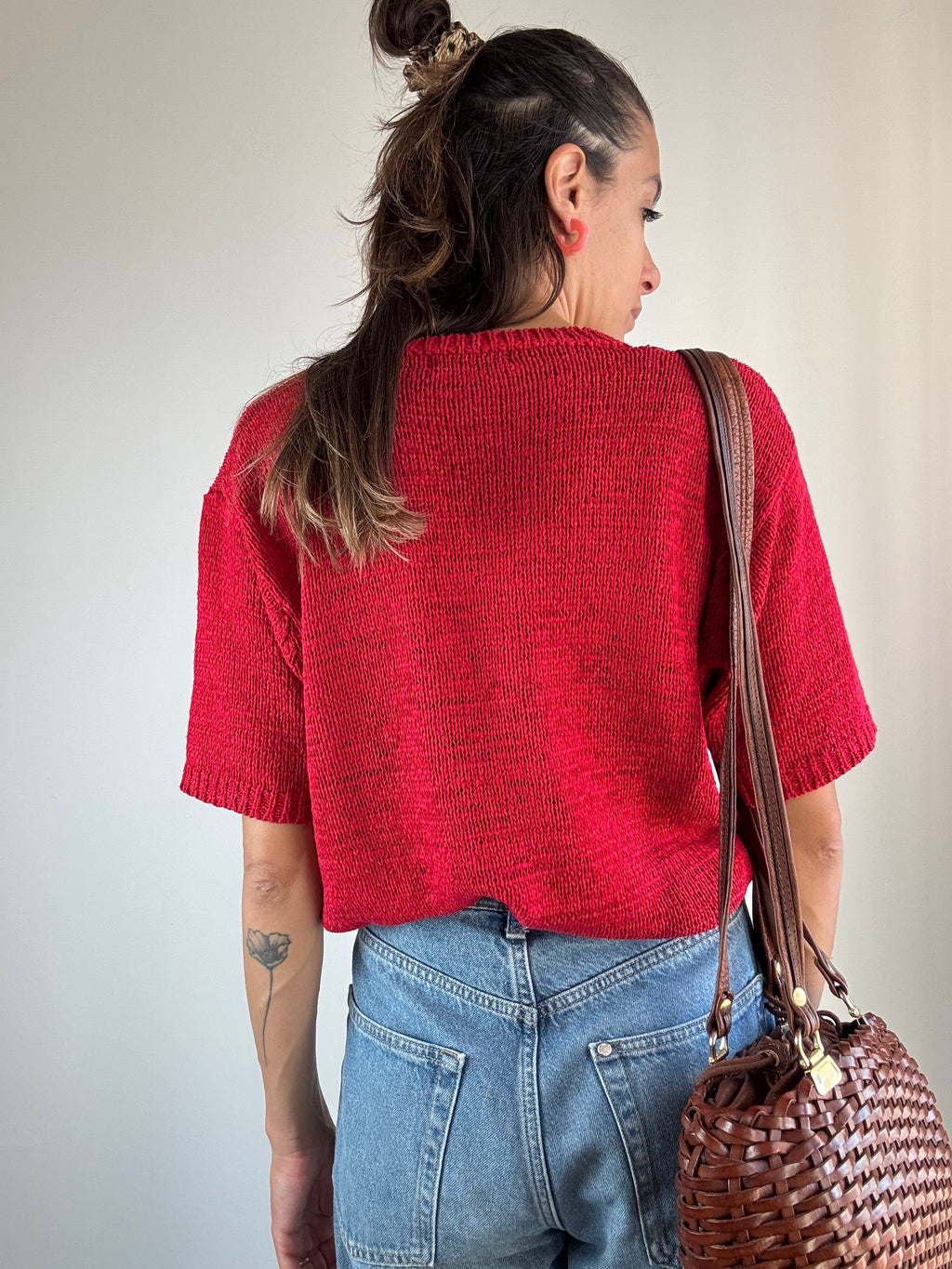 Maglia rossa a trecce