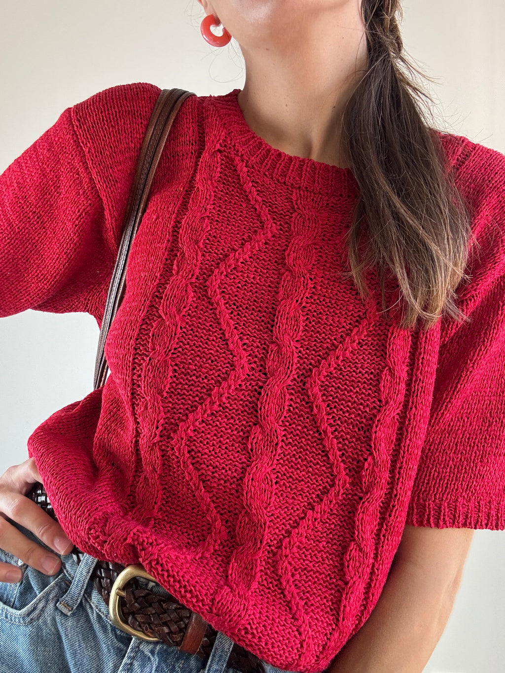 Maglia rossa a trecce