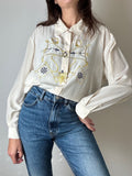 Camicia in seta panna con ricami oro e blu