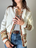 Cardigan bianco con papere