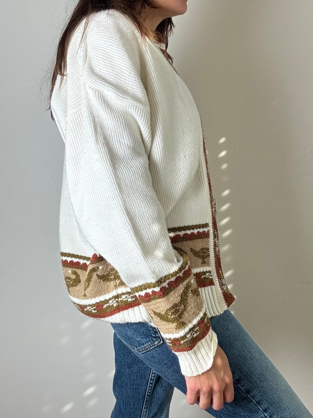 Cardigan bianco con papere