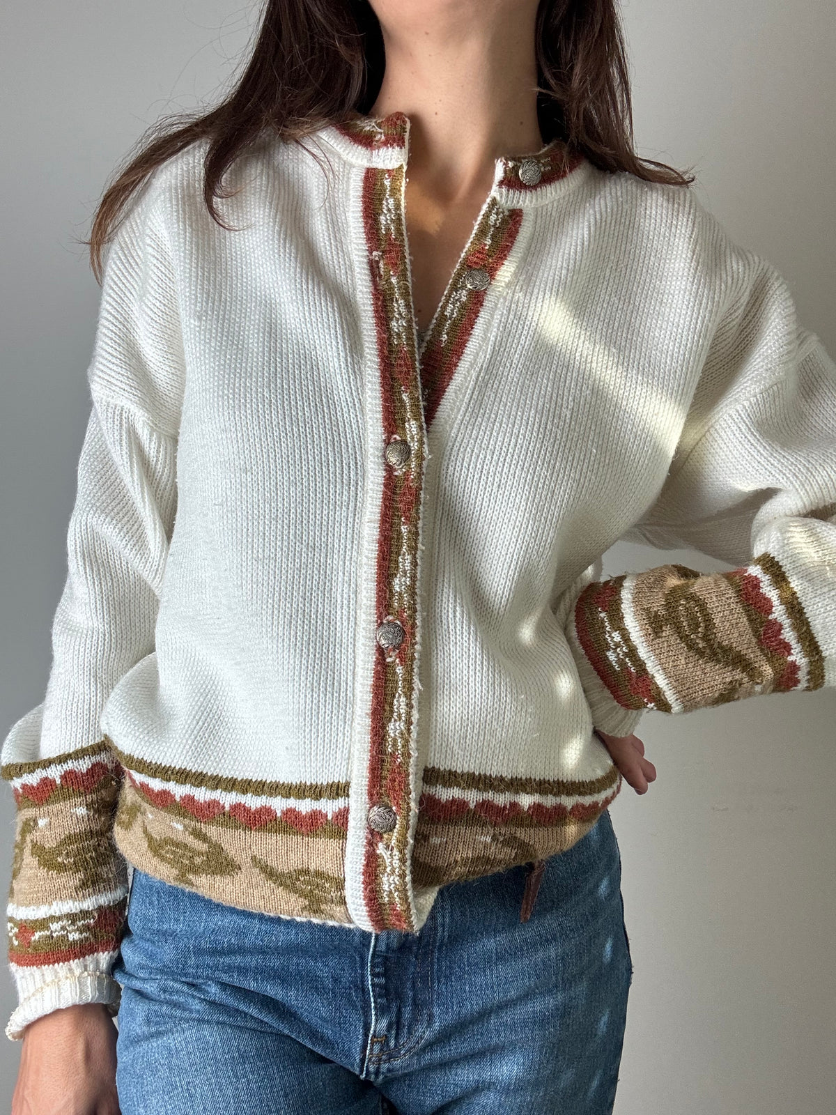 Cardigan bianco con papere