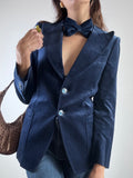 Giacca in velluto blu con papillon