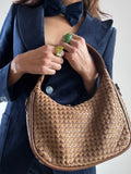 Borsa marrone in pelle e camoscio intrecciati