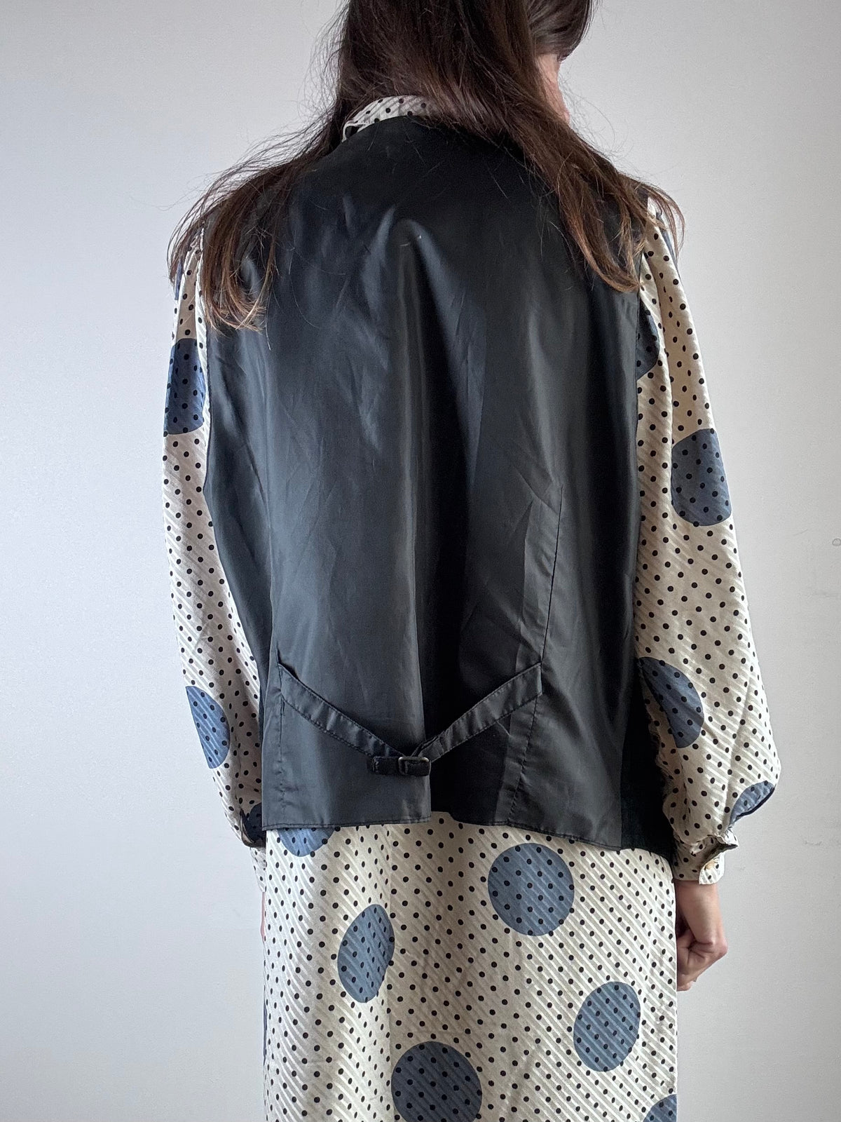 Gilet nero in camoscio e tessuto